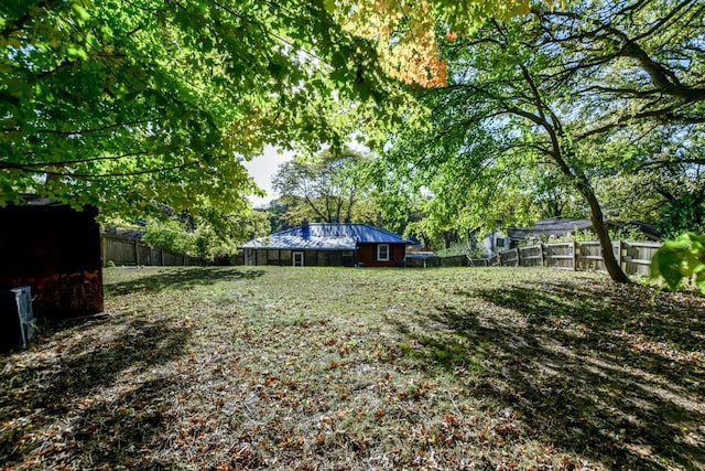 view of yard with a fenced backyard