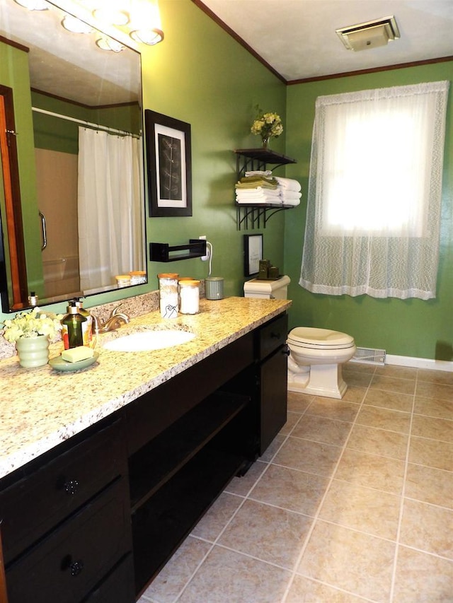 full bathroom with toilet, vanity, visible vents, tile patterned floors, and crown molding