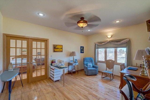 sitting room featuring recessed lighting, french doors, and light wood finished floors