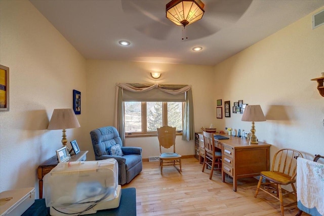 interior space featuring recessed lighting, visible vents, baseboards, and light wood finished floors