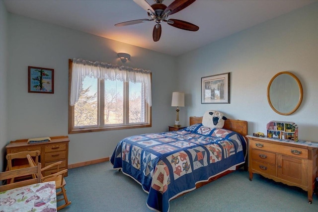 bedroom with a ceiling fan, carpet, and baseboards