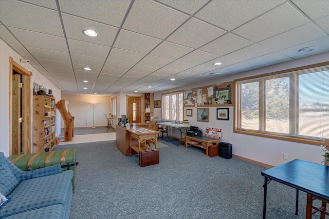 interior space with recessed lighting, a drop ceiling, baseboards, and carpet