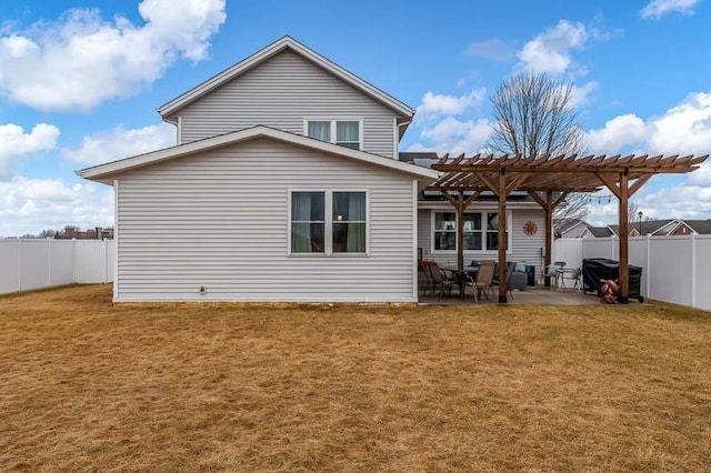 back of property with a patio area, fence, a lawn, and a pergola