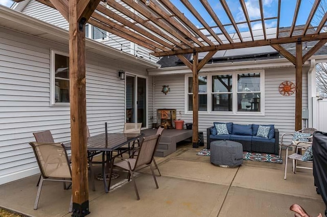 view of patio with outdoor dining area, outdoor lounge area, and a pergola