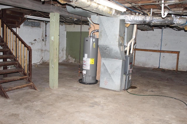 unfinished basement featuring stairs, gas water heater, and heating unit