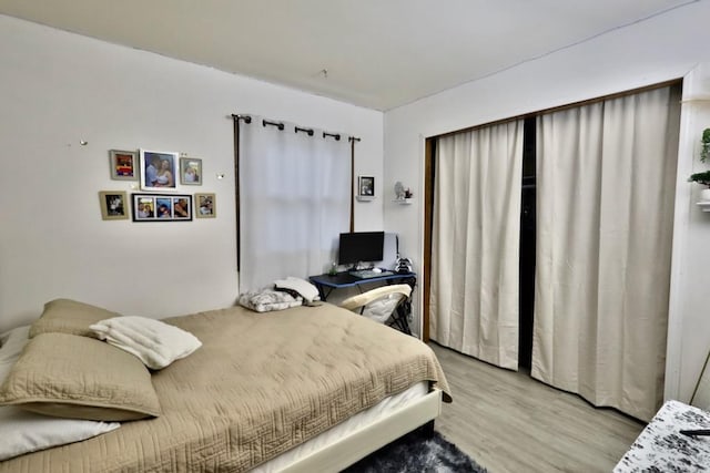 bedroom featuring light wood-type flooring