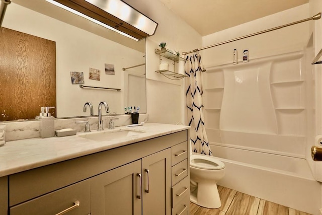 bathroom with toilet, vanity, wood finished floors, and shower / tub combo with curtain