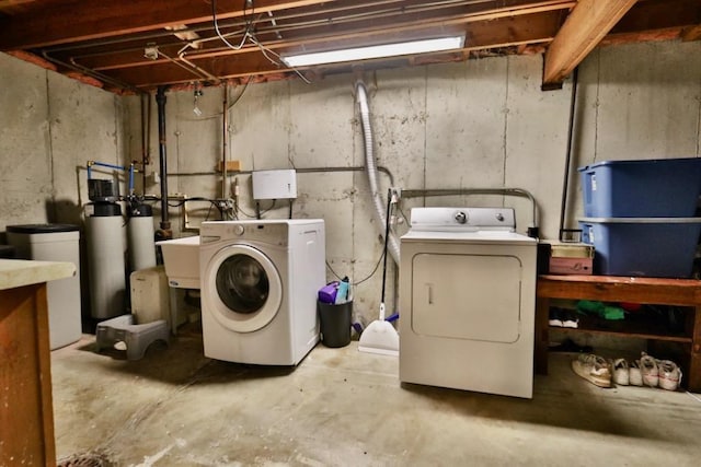 laundry area with washer and dryer and laundry area