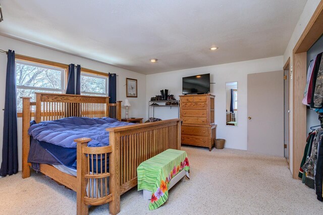 bedroom with carpet and recessed lighting