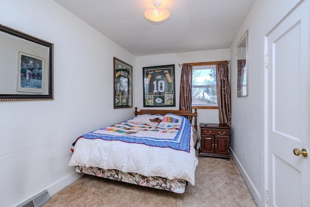 bedroom featuring carpet, visible vents, and baseboards