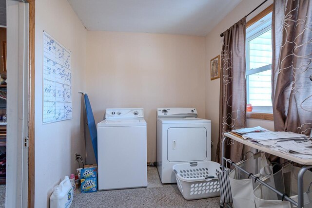 laundry area with laundry area and washer and dryer