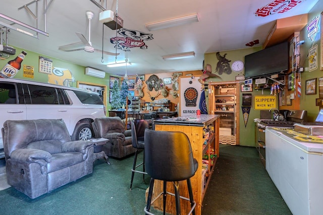 interior space featuring freestanding refrigerator and a wall mounted AC