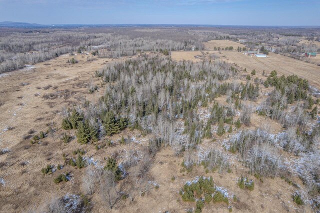 birds eye view of property featuring a rural view