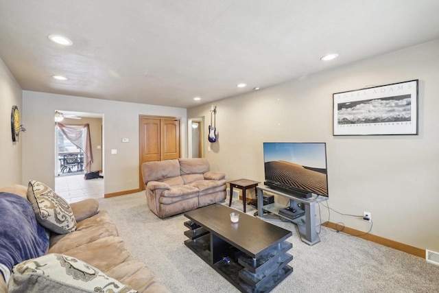 living room featuring carpet floors, recessed lighting, visible vents, and baseboards