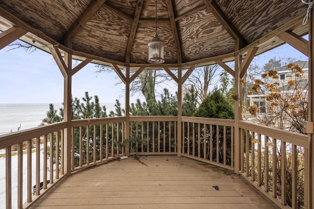 deck featuring a water view and a gazebo