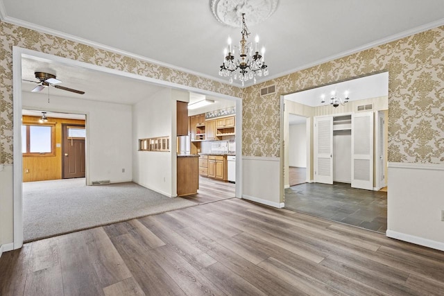 interior space with wainscoting, visible vents, and wallpapered walls