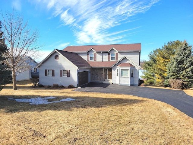 traditional-style home with a front yard