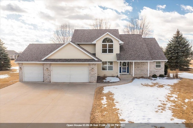 view of front of home featuring a garage, a shingled roof, concrete driveway, and brick siding