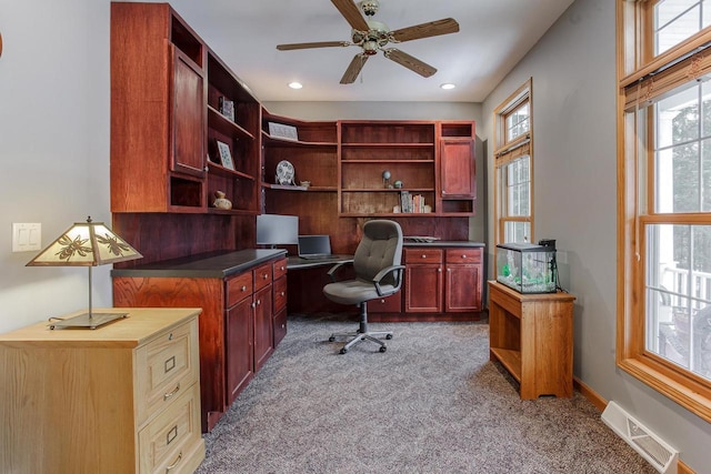 home office featuring recessed lighting, carpet flooring, visible vents, baseboards, and a ceiling fan