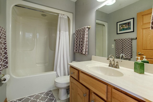 full bath featuring shower / bathtub combination with curtain, tile patterned flooring, vanity, and toilet