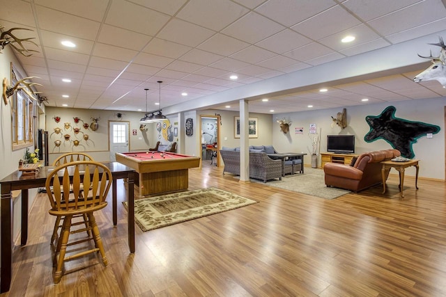 recreation room with pool table, wood finished floors, a paneled ceiling, and recessed lighting