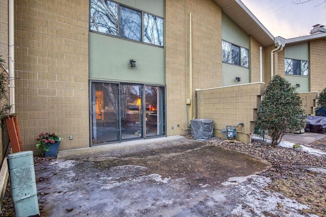 back of house with a patio