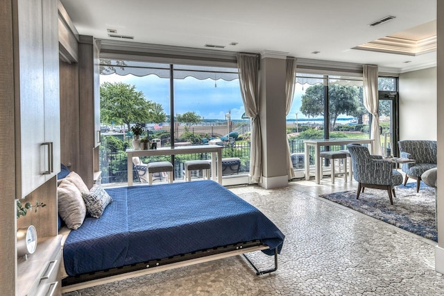 bedroom featuring ornamental molding, multiple windows, granite finish floor, and visible vents