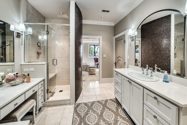 bathroom with a stall shower, visible vents, crown molding, and vanity