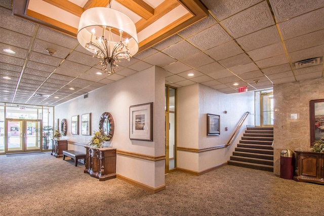 lobby with stairs and visible vents