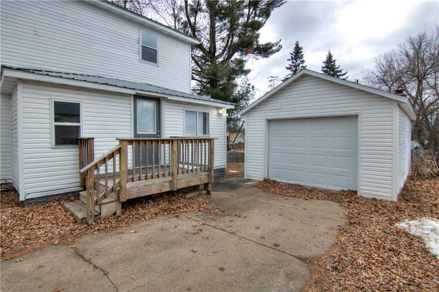 exterior space with concrete driveway