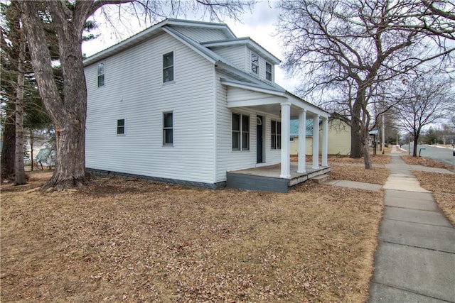 view of home's exterior featuring a porch