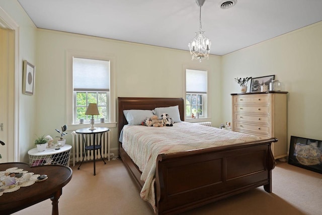 bedroom featuring light carpet, visible vents, radiator heating unit, and an inviting chandelier