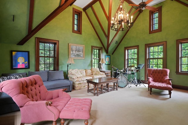 carpeted living room with high vaulted ceiling and a notable chandelier