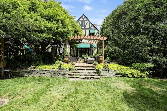 back of house featuring a patio, a lawn, outdoor lounge area, and a pergola