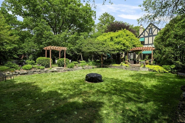 view of yard with a pergola