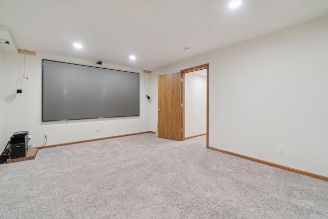 carpeted cinema featuring recessed lighting and baseboards