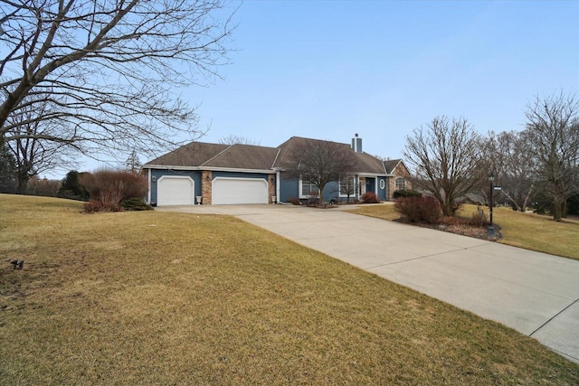 single story home featuring a garage, a chimney, a front lawn, and concrete driveway