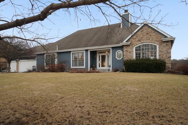 single story home featuring an attached garage, a chimney, a front lawn, and roof with shingles