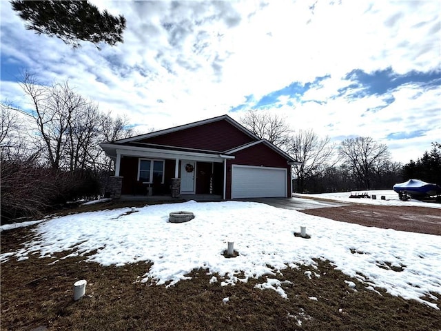 view of front of home with a garage and driveway