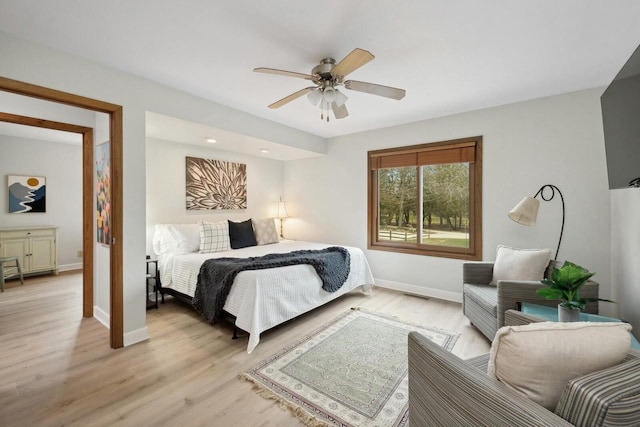 N2021 N Lake Shore Dr, Fontana, WI 53125 - bedroom featuring baseboards, ceiling fan, visible vents, and light wood-style floors