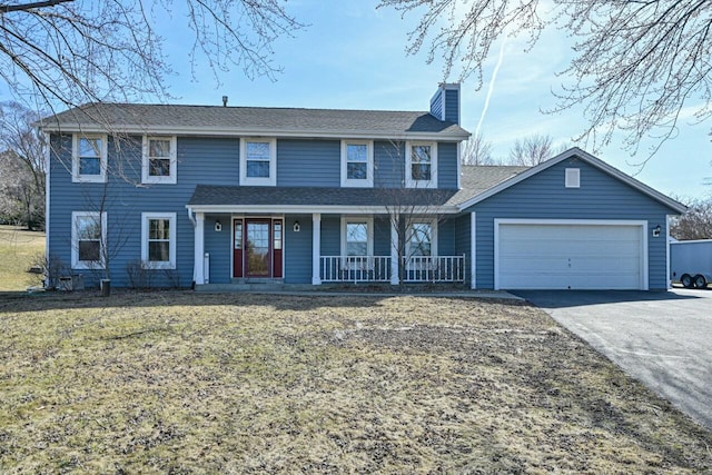 view of front of house featuring concrete driveway, roof with shingles, covered porch, a chimney, and a garage