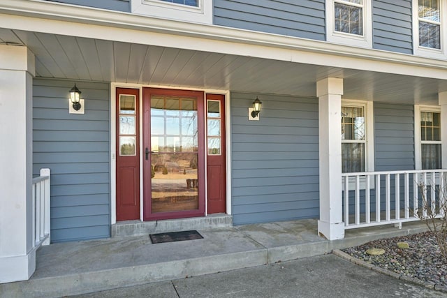 entrance to property with a porch