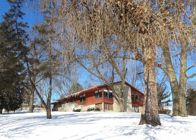 view of snow covered property