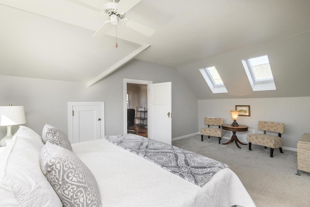 carpeted bedroom featuring vaulted ceiling, a ceiling fan, and baseboards