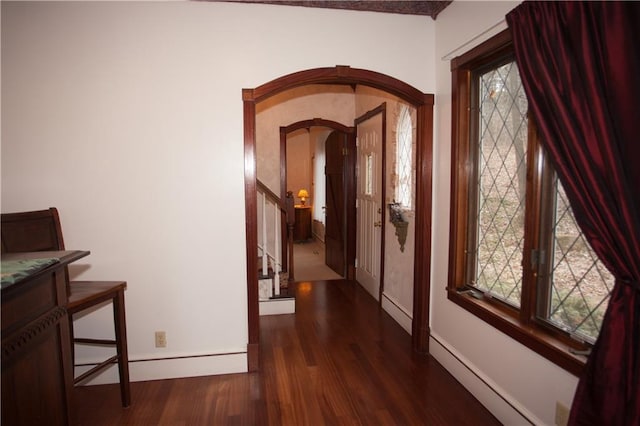 N7843 540th St, Menomonie, WI 54751 - corridor with baseboards, stairs, arched walkways, and wood finished floors