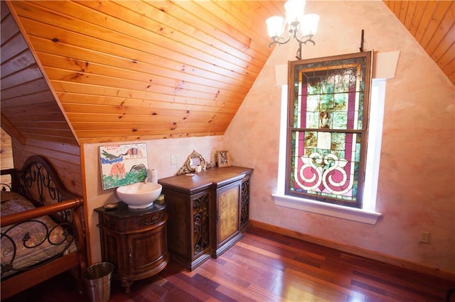 N7843 540th St, Menomonie, WI 54751 - interior space with baseboards, wood ceiling, wood finished floors, vaulted ceiling, and a notable chandelier