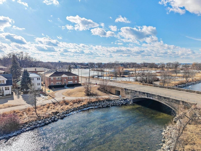 aerial view featuring a water view and a residential view