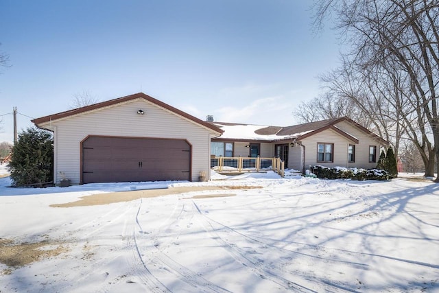 single story home with a garage