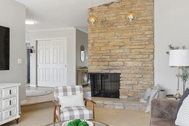 living room featuring crown molding and a brick fireplace