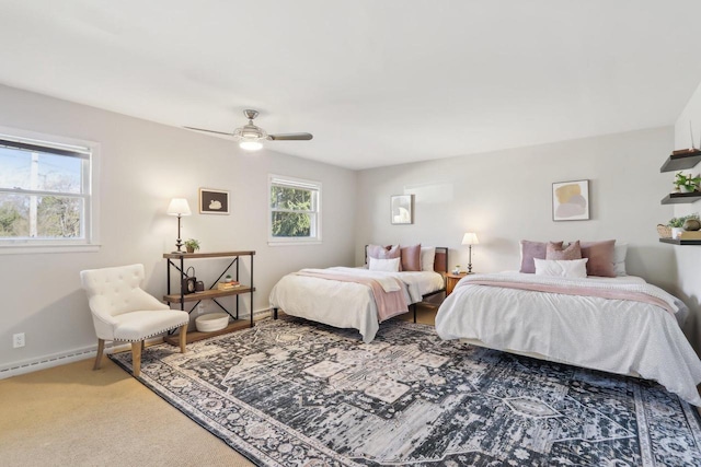 bedroom with light carpet, multiple windows, a ceiling fan, and baseboards